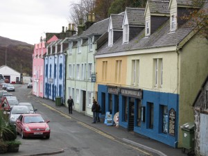 Colorful buildings near the water's edge; Portree, The Isle of Skye