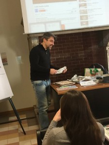 Our Italian professor, Andrea, slicing an AMAZING cake his wife made for us